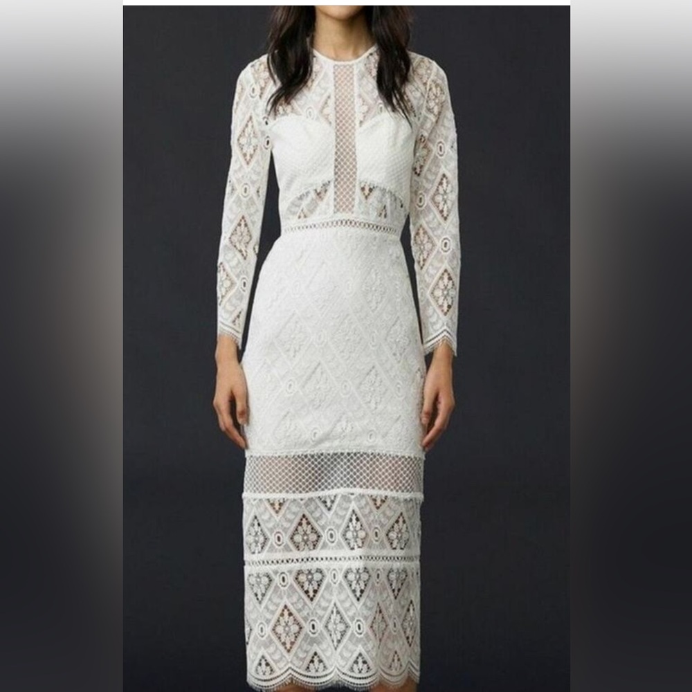 Gorgeous candlelight lace designer dress, never worn, no tags.